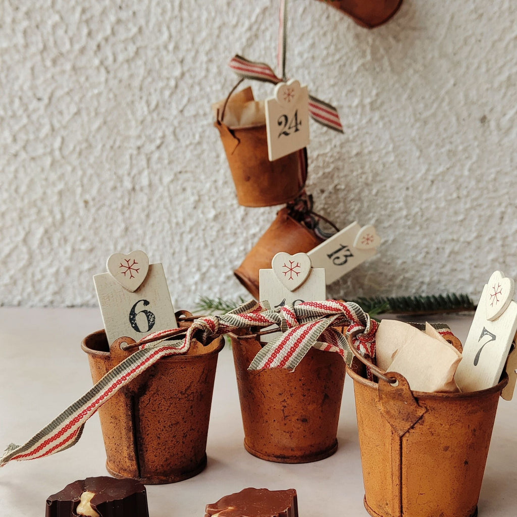 “Bean and Goose Islands Advent Calendar – 24 numbered chocolate boxes in a keepsake cotton bag, handcrafted in Ireland.”