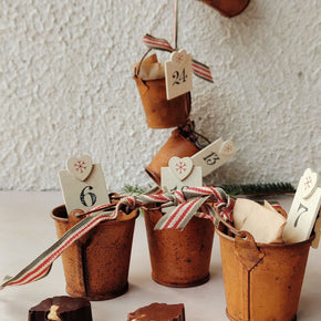 “Bean and Goose Islands Advent Calendar – 24 numbered chocolate boxes in a keepsake cotton bag, handcrafted in Ireland.”