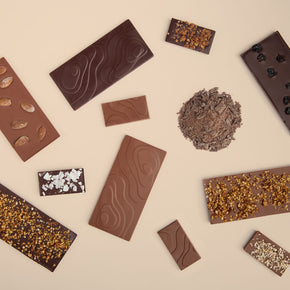 Bean and Goose Chocolate bars cafe bars and hot chocolate unwrapped showing the unique patent landscape  design of their moulds