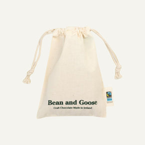 Beige drawstring bag with 'Bean and Goose' branding on a white background
