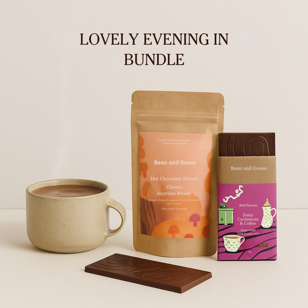 Bean and Goose hot chocolate bundle with a mug, chocolate bar, and packaging on a beige background.