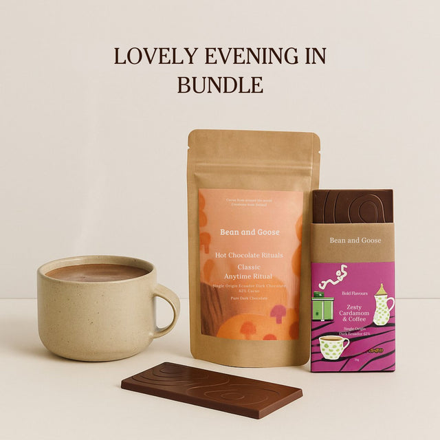 Bean and Goose hot chocolate bundle with a mug, chocolate bar, and packaging on a beige background.