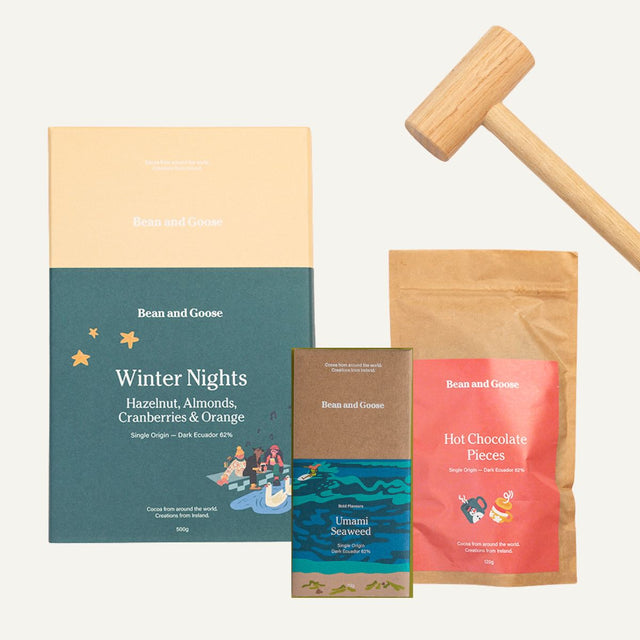 Bean and Goose chocolate packaging with a an oak hammer on a linen background