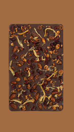 Bean and Goose Opened Winters NIght Sharing Slab on a Warm Clay background