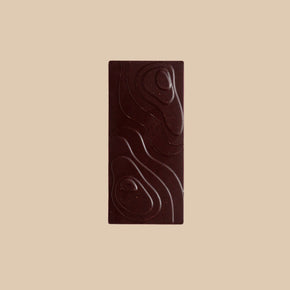Bean and Goose Dark chocolate bar with their patent landscape bar design on a beige background