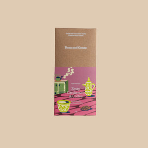 Bean and Goose Zesty Dark Chocolate bar package on a beige background